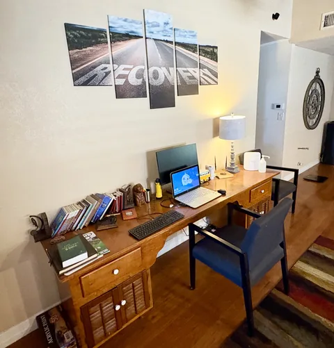 Study desk and quiet work area with recovery wall art